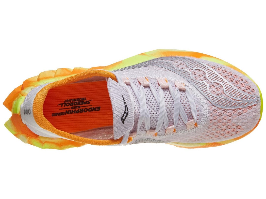 Left shoe of the Saucony Endorphin Pro 4. Upper is white. Midsole is yellow and orange.