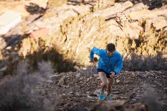 Tim running up a mountain